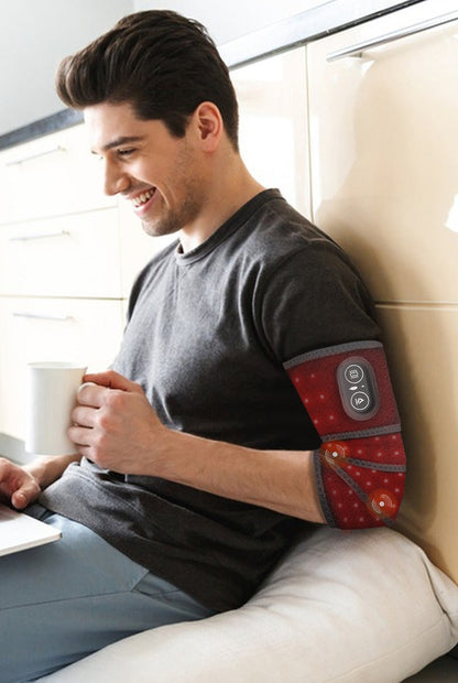 EmberWrap™ Cordless Red Light & Heat Wrap used on the couch, no cord attached