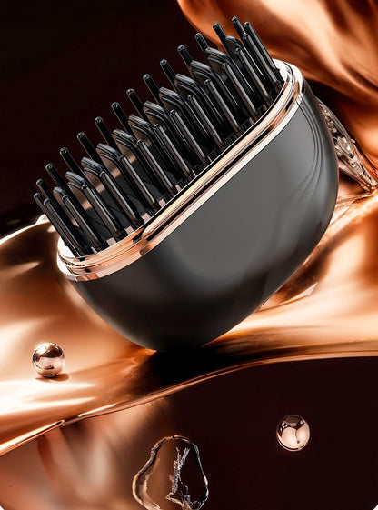 SleekPod cordless straightening brush in Black on a bronze backdrop
