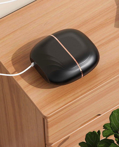 SleekPod charging over USB-C on a wooden dresser