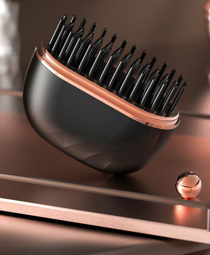 SleekPod cordless straightening brush in Black on a vanity